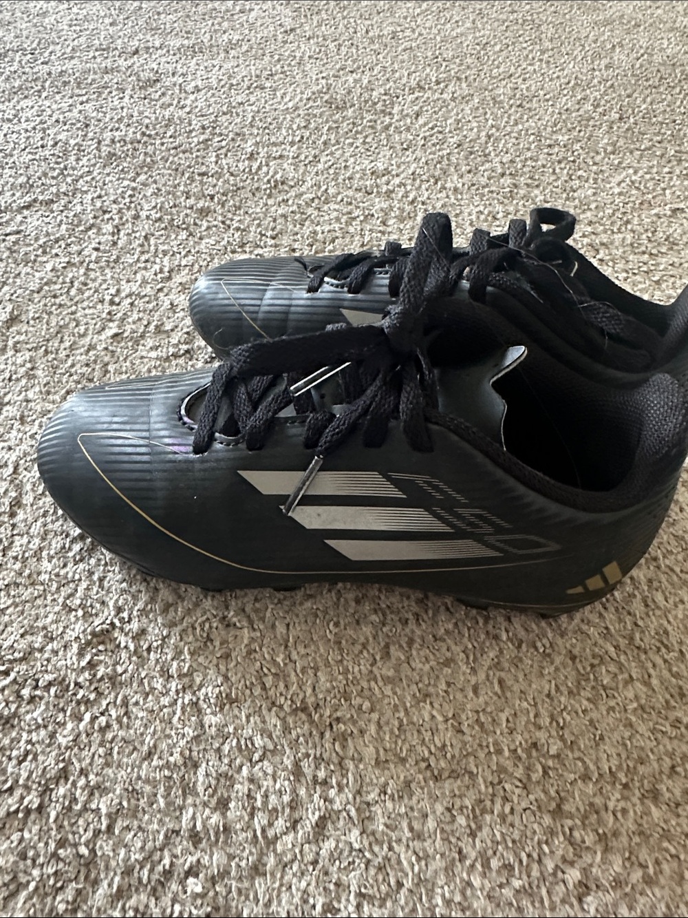adidas Black Soccer Cleats with Gold Accents
